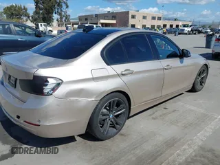 2013 BMW 3 Series 328i with VIN WBA3C1G58DNR44453, listed as a IAAI auction lot 41948831 with 170,153 mi miles. Bid and sale history available at carsss.com. Image 4.