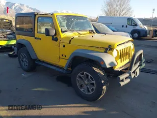 2009 Jeep Wrangler X with VIN 1J4FA24159L779696, listed as a IAAI auction lot 41450202 with 154,943 mi miles and . Bid and sale history available at DreamBid. Image 1.