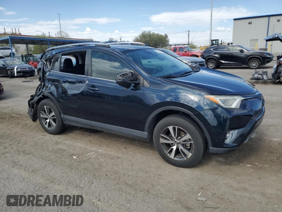 2018 Toyota RAV4 XLE with VIN JTMWFREV7JD130465, listed as a Copart auction lot 63314795 with 97,334 mi miles and Salvage title. Bid and sale history available at DreamBid. Image 4.