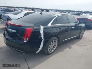 2013 Cadillac XTS Luxury with VIN 2G61R5S34D9135026, listed as a IAAI auction lot 41686214 with 92,732 mi miles. Bid and sale history available at carsss.com. Image 4.