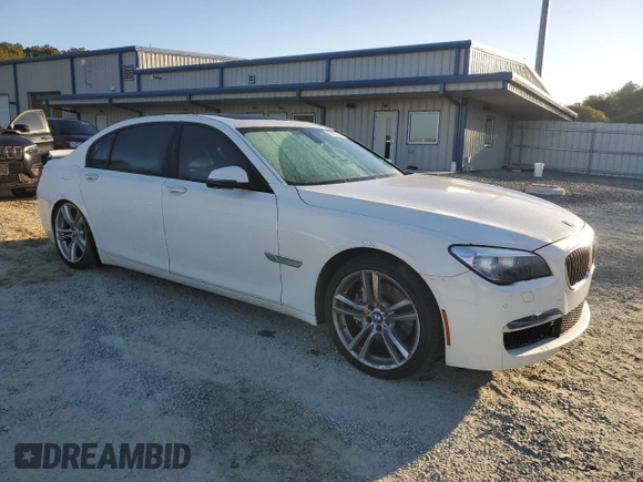 2015 BMW 7 Series 740Li with VIN WBAYE4C59FD139044, listed as a Copart auction lot 75907584 with 113,587 mi miles and Salvage Title. Bid and sale history available at DreamBid. Image 4.