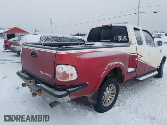 1998 Ford F-150 XL with VIN 2FTRX08L2WCA75995, listed as a Copart auction lot 43717305 with 301,987 mi miles and Salvage title. Bid and sale history available at DreamBid. Image 3.