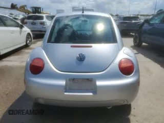 2002 Volkswagen Beetle GLS with VIN 3VWCB21C32M410168, listed as a Copart auction lot 55098545 with 166,410 mi miles and Salvage title. Bid and sale history available at DreamBid. Image 6.