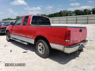 1998 Ford F-150 with VIN 1FTZX1761WKA53404, listed as a Copart auction lot 80628524 with 253,399 mi miles and Salvage title. Bid and sale history available at DreamBid. Image 2.