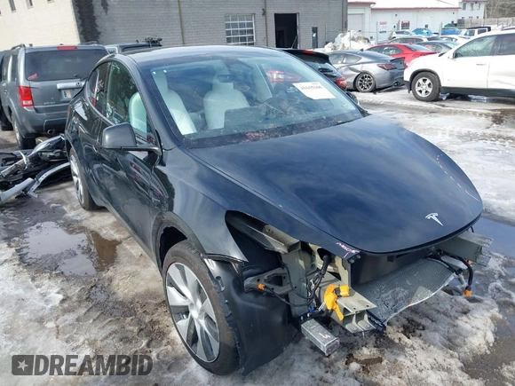 2023 Tesla Model Y Long Range z VIN 7SAYGDEE8PF826989, wystawiony jako IAAI lot #41615166 z przebiegiem 10 368 mil mil oraz . Historia ofert i sprzedaży dostępna na DreamBid. Obrazek 1.