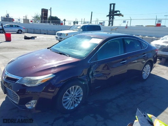 2014 Toyota Avalon Hybrid Limited with VIN 4T1BD1EB1EU018886, listed as a IAAI auction lot 41651673 with 137,890 mi miles. Bid and sale history available at carsss.com. Image 2.