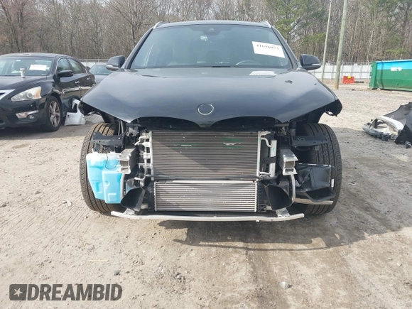 2021 BMW X1 xDrive28i with VIN WBXJG9C05M5T83784, listed as a IAAI auction lot 41696073 with 15,865 mi miles and . Bid and sale history available at DreamBid. Image 6.