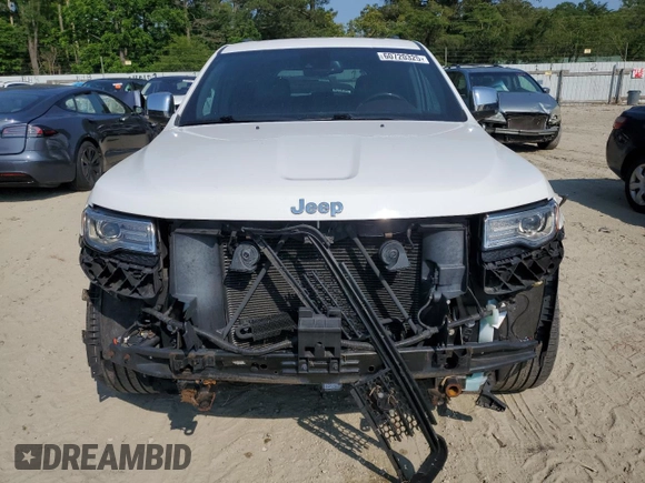 2014 Jeep Grand Cherokee Summit with VIN 1C4RJFJG9EC474781, listed as a Copart auction lot 60720325 with 64,546 mi miles and Salvage title. Bid and sale history available at DreamBid. Image 5.