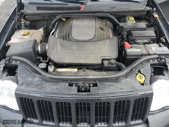2010 Jeep Grand Cherokee Laredo with VIN 1J4RR4GT7AC120604, listed as a Copart auction lot 84257724 with 60,827 mi miles and Salvage Title. Bid and sale history available at carsss.com. Image 14.