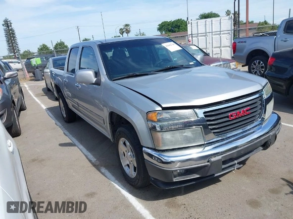 2010 GMC Canyon SLE1 with VIN 1GTDSCDEXA8138621, listed as a IAAI auction lot 42042749 with 169,354 mi miles. Bid and sale history available at carsss.com. Image 1.