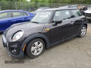 2014 MINI Hardtop with VIN WMWXM5C57ET932920, listed as a Copart auction lot 55810575 with 73,151 mi miles and Salvage title. Bid and sale history available at DreamBid. Image 1.