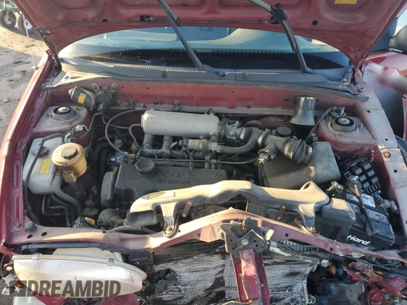 1997 Hyundai Accent z VIN KMHVF24N9VU356190, wystawiony jako Copart lot #85610774 z przebiegiem 91 707 mil mil oraz Tytuł czysty. Historia ofert i sprzedaży dostępna na DreamBid. Obrazek 11.