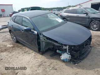 2021 Mazda CX-30 Select with VIN 3MVDMBBL5MM313863, listed as a IAAI auction lot 42458744 with 39,875 mi miles and . Bid and sale history available at DreamBid. Image 1.
