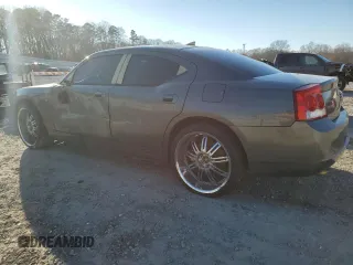 2009 Dodge Charger Police with VIN 2B3KA43T39H641981, listed as a Copart auction lot 88724085 with 145,779 mi miles and Salvage Title. Bid and sale history available at carsss.com. Image 2.