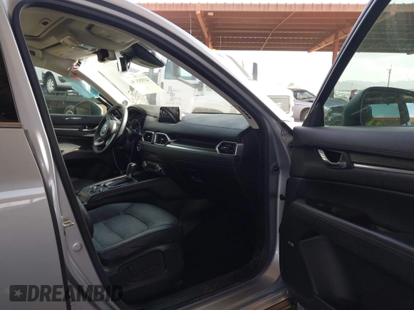 2017 Mazda CX-5 Grand Touring with VIN JM3KFADL3H0121772, listed as a IAAI auction lot 41935183 with 48,869 mi miles and . Bid and sale history available at carsss.com. Image 5.