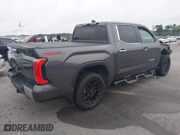 2022 Toyota Tundra Limited with VIN 5TFJA5AB5NX010780, listed as a IAAI auction lot 42446780 with 47,114 mi miles and . Bid and sale history available at DreamBid. Image 4.