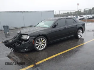 2015 Chrysler 300 C with VIN 2C3CCAEG8FH786879, listed as a IAAI auction lot 41563321 with 130,060 mi miles and . Bid and sale history available at carsss.com. Image 17.