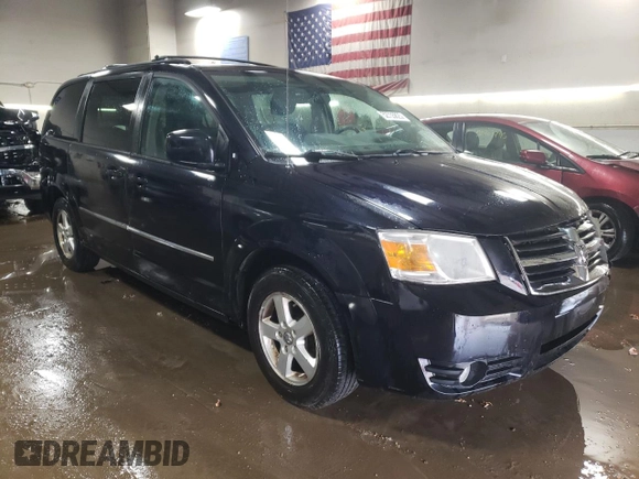 2010 Dodge Grand Caravan SXT with VIN 2D4RN5D15AR140564, listed as a Copart auction lot 52735825 with 187,744 mi miles and Salvage Title. Bid and sale history available at DreamBid. Image 4.