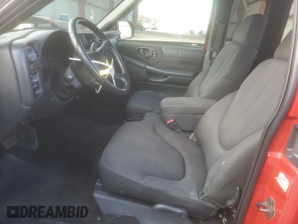 2003 GMC Sonoma SLS z VIN 1GTCS19X538165030, wystawiony jako Copart lot #81485724 z przebiegiem Nie podano mil oraz Szkoda całkowita • Salvage title. Historia ofert i sprzedaży dostępna na DreamBid. Obrazek 7.