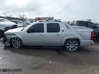 2013 Chevrolet Avalanche LTZ with VIN 3GNTKGE73DG306592, listed as a IAAI auction lot 41695072 with 243,700 mi miles. Bid and sale history available at carsss.com. Image 14.