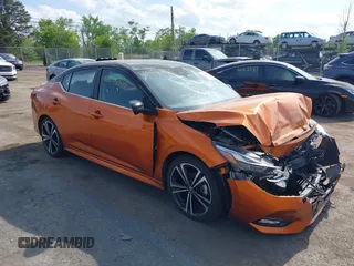 2022 Nissan Sentra SR z VIN 3N1AB8DV1NY299761, wystawiony jako IAAI lot #42166394 z przebiegiem 32 841 mil mil oraz . Historia ofert i sprzedaży dostępna na DreamBid. Obrazek 1.