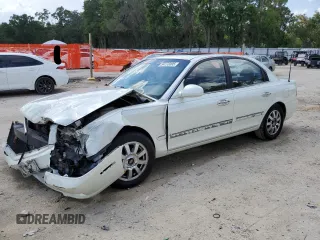 2002 Kia Optima LX z VIN KNAGD126725145341, wystawiony jako Copart lot #54773395 z przebiegiem 135 888 mil mil oraz Szkoda całkowita • Salvage title. Historia ofert i sprzedaży dostępna na DreamBid. Obrazek 1.