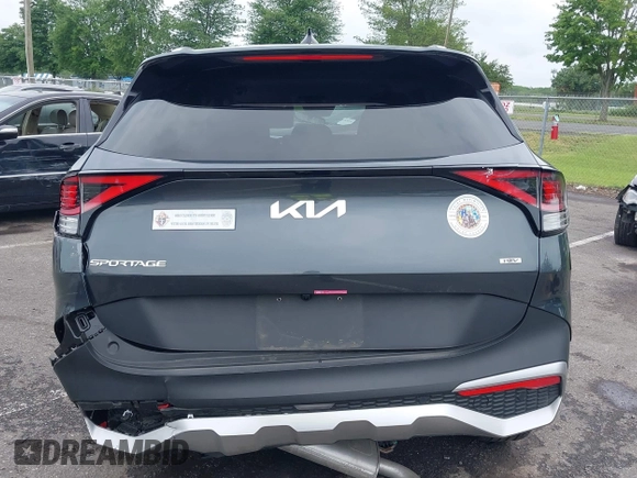 2023 Kia Sportage EX with VIN KNDPVCAG1P7110909, listed as a IAAI auction lot 42646436 with 16,304 mi miles and . Bid and sale history available at DreamBid. Image 16.