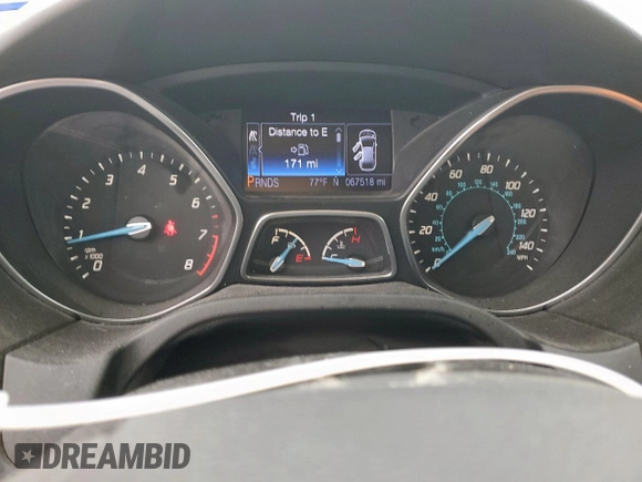 2013 Ford Focus SE z VIN 1FADP3F23DL108047, wystawiony jako Copart lot #57450795 z przebiegiem 67 518 mil mil oraz Szkoda całkowita • Salvage title. Historia ofert i sprzedaży dostępna na DreamBid. Obrazek 9.