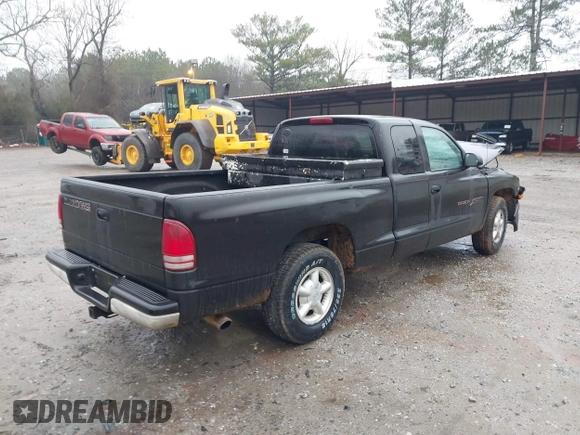 1997 Dodge Dakota with VIN 1B7GL23X2VS209651, listed as a IAAI auction lot 41421859 with 246,016 mi miles. Bid and sale history available at carsss.com. Image 4.