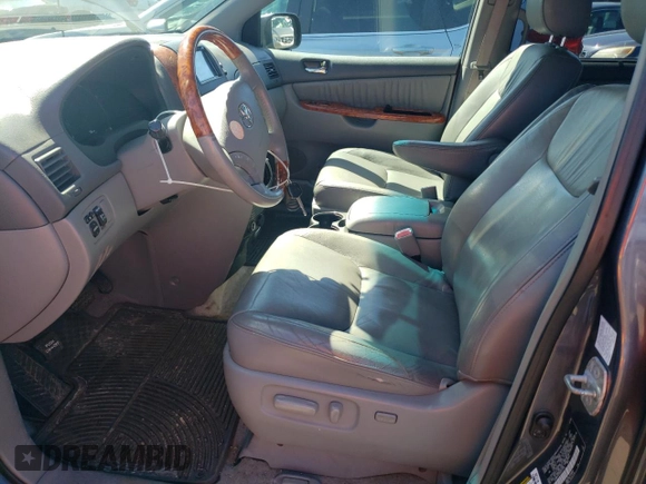 2009 Toyota Sienna XLE with VIN 5TDBK22CX9S027125, listed as a Copart auction lot 51850075 with 197,006 mi miles and Salvage Title. Bid and sale history available at DreamBid. Image 7.