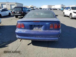 1996 Ford Mustang with VIN 1FALP404XTF190707, listed as a Copart auction lot 79583054 with 197,695 mi miles and Salvage Title. Bid and sale history available at carsss.com. Image 6.
