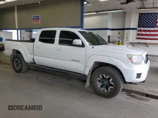 2015 Toyota Tacoma with VIN 3TMMU4FN2FM086482, listed as a Copart auction lot 57124365 with 211,638 mi miles and Salvage title. Bid and sale history available at DreamBid. Image 4.