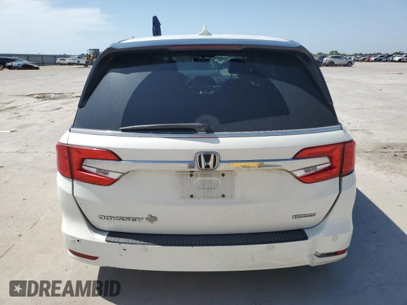 2019 Honda Odyssey Touring with VIN 5FNRL6H86KB089055, listed as a Copart auction lot 56980975 with 154,842 mi miles and Salvage title. Bid and sale history available at DreamBid. Image 6.