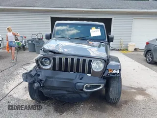 2022 Jeep Wrangler Unlimited Sahara Altitude z VIN 1C4HJXEG6NW103779, wystawiony jako IAAI lot #42563826 z przebiegiem 79 315 mil mil oraz . Historia ofert i sprzedaży dostępna na DreamBid. Obrazek 12.