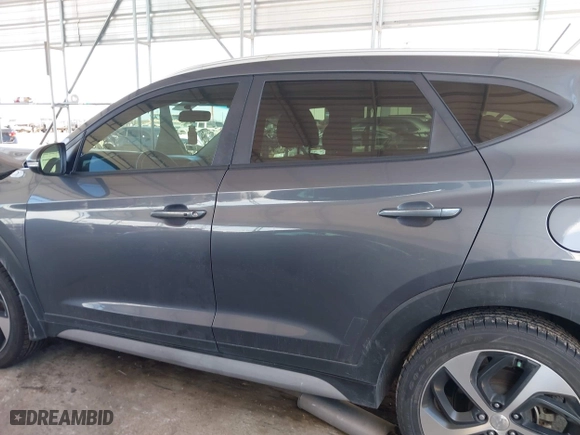 2017 Hyundai Tucson Value with VIN KM8J33A23HU472898, listed as a IAAI auction lot 41634205 with 81,690 mi miles. Bid and sale history available at carsss.com. Image 15.
