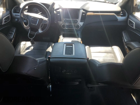2015 GMC Yukon Denali with VIN 1GKS2CKJ5FR612147, listed as a Copart auction lot 49209525 with 127,262 mi miles and Salvage Title. Bid and sale history available at carsss.com. Image 8.