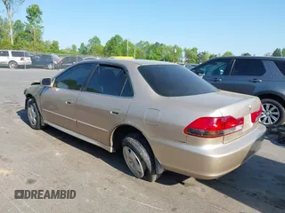 2002 Honda Accord EX z VIN 1HGCG16572A033397, wystawiony jako IAAI lot #42055022 z przebiegiem 225 073 mil mil oraz . Historia ofert i sprzedaży dostępna na DreamBid. Obrazek 3.