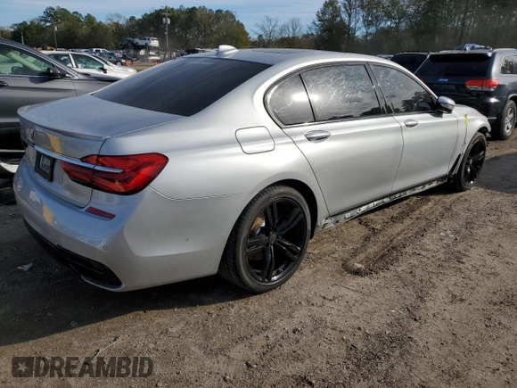 2017 BMW 7 Series 740i with VIN WBA7E2C59HG739984, listed as a Copart auction lot 37475514 with 54,841 mi miles. Bid and sale history available at carsss.com. Image 3.