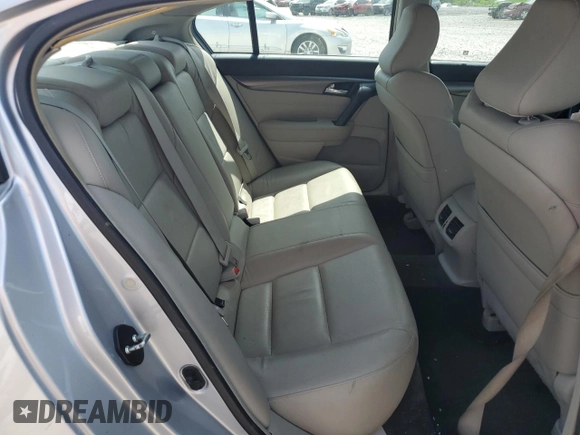 2013 Acura TL z VIN 19UUA8F23DA006558, wystawiony jako Copart lot #56178655 z przebiegiem 193 517 mil mil oraz Szkoda całkowita • Salvage title. Historia ofert i sprzedaży dostępna na DreamBid. Obrazek 10.