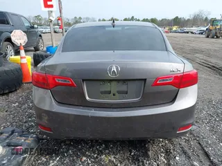 2013 Acura ILX Premium z VIN 19VDE1F54DE001539, wystawiony jako IAAI lot #42015973 z przebiegiem Nie podano mil oraz . Historia ofert i sprzedaży dostępna na DreamBid. Obrazek 15.