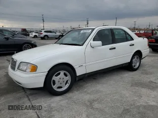 1997 Mercedes-Benz C with VIN WDBHA28E3VF582237, listed as a Copart auction lot 76826534 with 240,702 mi miles and Clean Title. Bid and sale history available at carsss.com. Image 1.