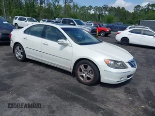 2005 Acura RL z VIN JH4KB16565C018356, wystawiony jako IAAI lot #42138971 z przebiegiem 186 437 mil mil oraz . Historia ofert i sprzedaży dostępna na DreamBid. Obrazek 1.