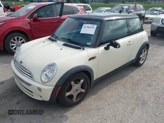 2006 MINI Hardtop with VIN WMWRC33566TK73763, listed as a IAAI auction lot 42782654 with 103,751 mi miles and . Bid and sale history available at DreamBid. Image 2.