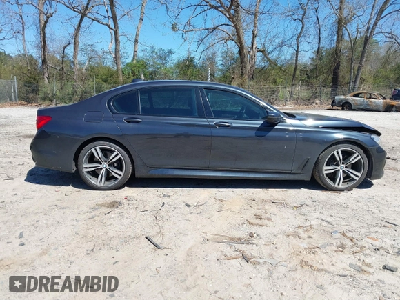 2016 BMW 7 Series 740i with VIN WBA7E2C54GG714649, listed as a IAAI auction lot 41815220 with 89,029 mi miles. Bid and sale history available at carsss.com. Image 13.