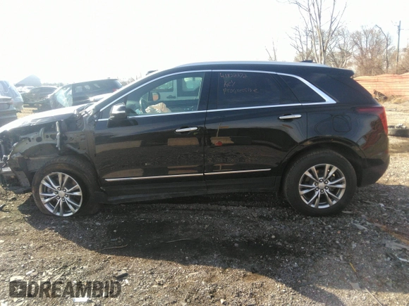 2022 Cadillac XT5 AWD Premium Luxury with VIN 1GYKNDR4XNZ164098, listed as a IAAI auction lot 41822372 with 32,644 mi miles and . Bid and sale history available at DreamBid. Image 14.