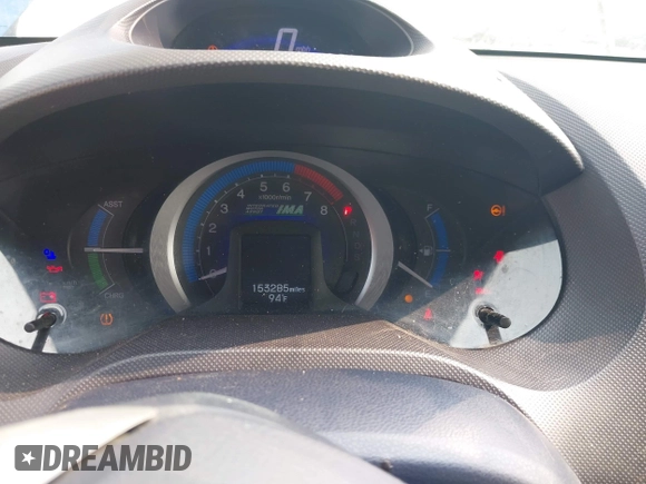 2010 Honda Insight EX z VIN JHMZE2H72AS020146, wystawiony jako IAAI lot #42412820 z przebiegiem 153 285 mil mil oraz . Historia ofert i sprzedaży dostępna na DreamBid. Obrazek 7.