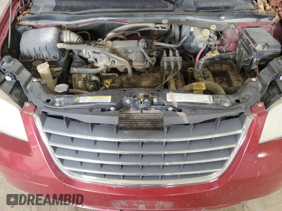 2010 Chrysler Town & Country LX with VIN 2A4RR4DE6AR198174, listed as a Copart auction lot 50757005 with 211,130 mi miles and Salvage Title. Bid and sale history available at DreamBid. Image 12.