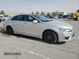 2018 Lincoln MKZ Reserve с VIN 3LN6L5FC7JR607221, выставлен на аукционе Copart как лот 57636675 с пробегом 80 396 миль миль и Списание • Salvage title. История ставок и продаж доступна на DreamBid. Изображение 4.