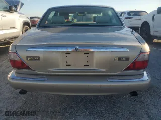 1998 Jaguar XJ with VIN SAJHX1247WC825160, listed as a Copart auction lot 74563884 with 0 mi miles and Non Repairable. Bid and sale history available at carsss.com. Image 6.