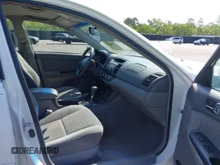 2006 Toyota Camry STD with VIN 4T1BE32KX6U734944, listed as a IAAI auction lot 42006245 with 243,967 mi miles. Bid and sale history available at carsss.com. Image 5.